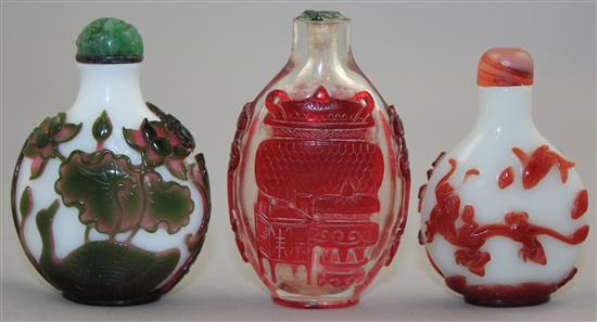 Three Chinese overlaid glass snuff bottles, 1850-1940, Richards no.s 277, 402 and 405